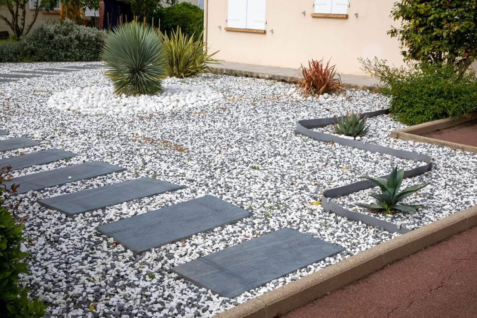 Modern garden with stones and plants.